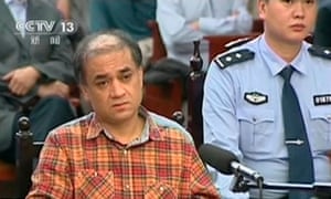 Uighur scholar Ilham Tohti during his trial on separatism charges in Urumqi, Xinjiang region, in September 2014. He is currently serving a life sentence