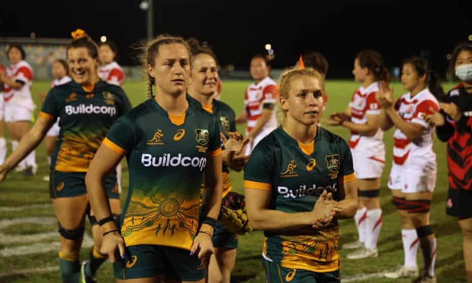 The Wallaroos leave the field after their two-point defeat to Japan on the Gold Coast.