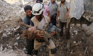 TOPSHOT-SYRIA-CONFLICT-ALEPPO<br>TOPSHOT - A Syrian civil defence volunteer, known as the White Helmets, holds the body of a child after he was pulled from the rubble following a government forces air strike on the rebel-held neighbourhood of Karm Homad in the northern city of Aleppo, on October 4, 2016.
Syrian regime forces advanced against rebels during intense street battles in the heart of Aleppo, after the United States abandoned talks with Russia aimed at reviving a ceasefire deal.
/ AFP / AMEER ALHALBI (Photo credit should read AMEER ALHALBI/AFP via Getty Images)