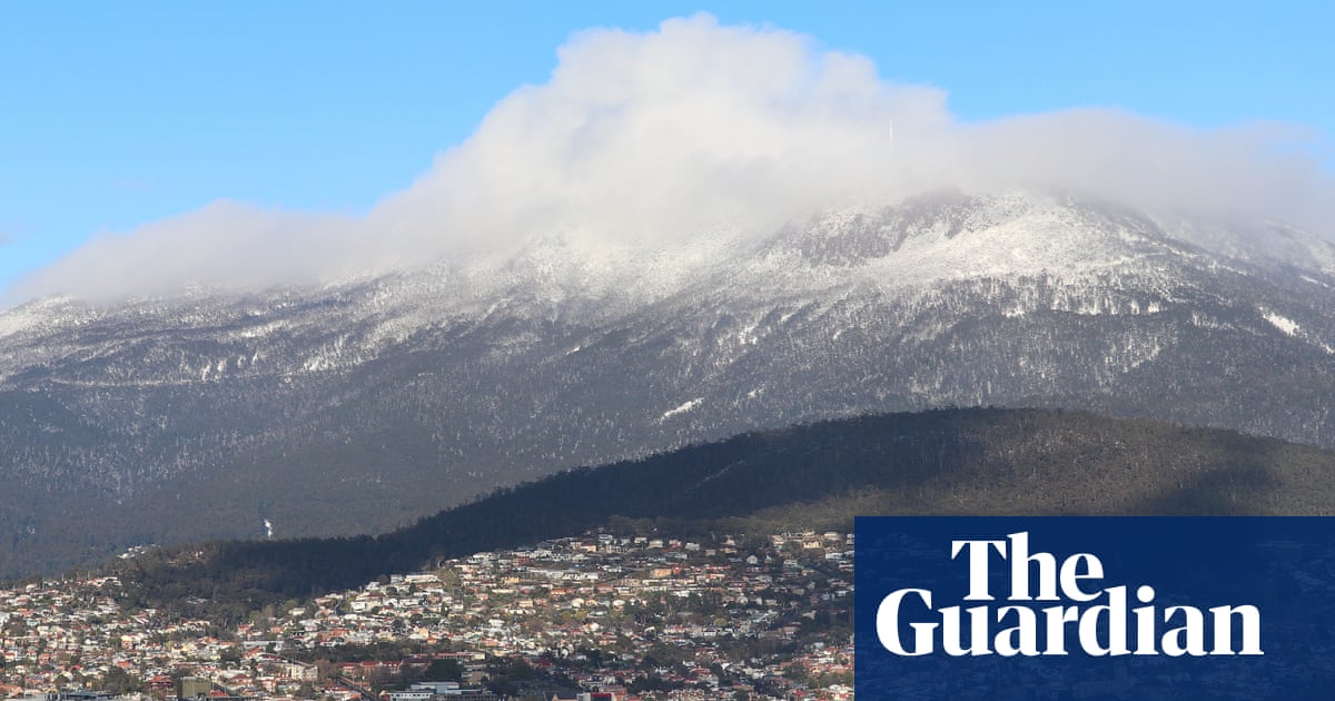 Wild storms cut power in Tasmania as Queensland prepares for intense rainfall