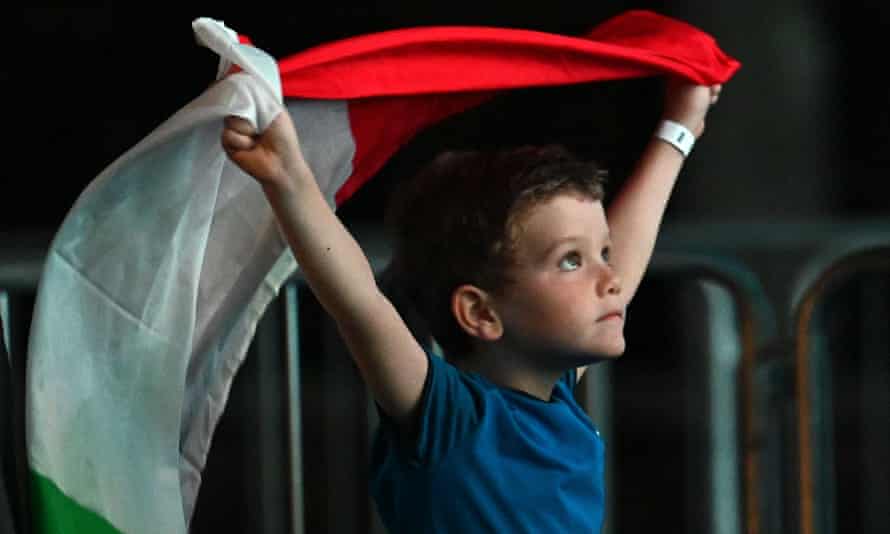 Boy waving the Italian flag
