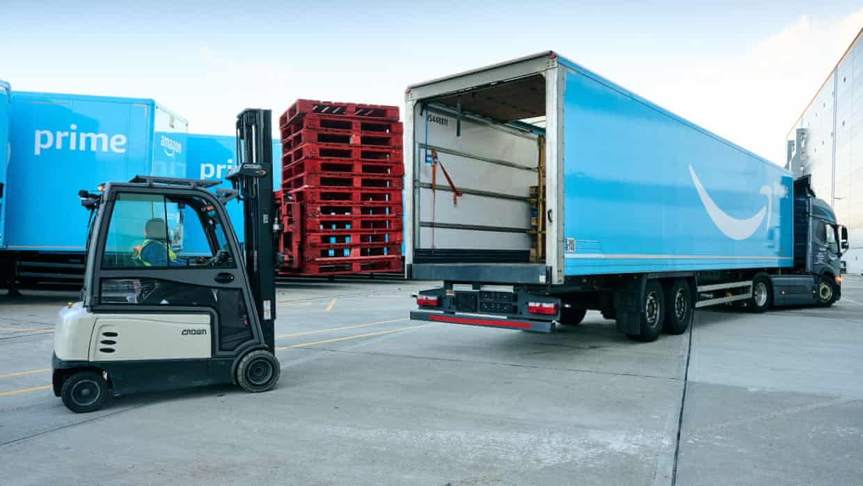 Forklift loading an Amazon trailer