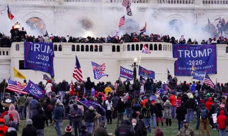 Rioters waving Trump banners