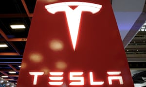 Tesla shares rose in after-hours trading despite the loss.