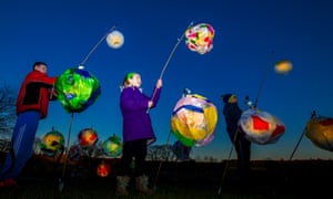 Kids with colourful lanterns on procession at Aysgarth Falls, Yorkshire Dales