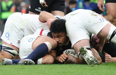 New Zealand's Leicester Fainga'anuku scores their first try against England.