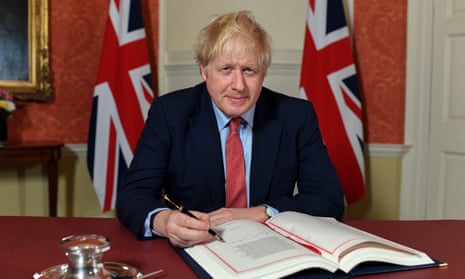 Boris Johnson signs the withdrawal agreement