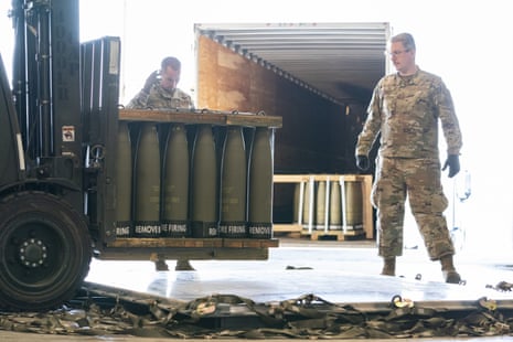 Airmen with the 436th Aerial Port Squadron place 155 mm shells on aircraft pallets ultimately bound for Ukraine on Friday at Dover Air Force Base, Delaware.
