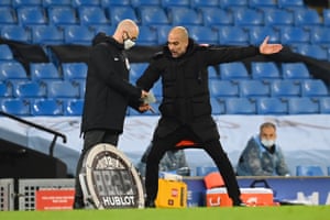 Pep Guardiola argues with fourth official Anthony Taylor.