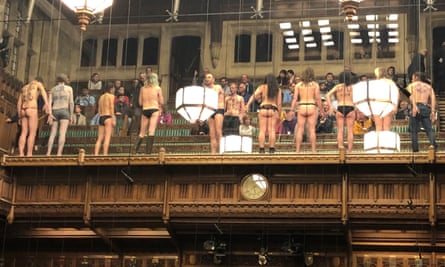An Extinction Rebellion protest in the public gallery of the UK parliament’s House of Commons.