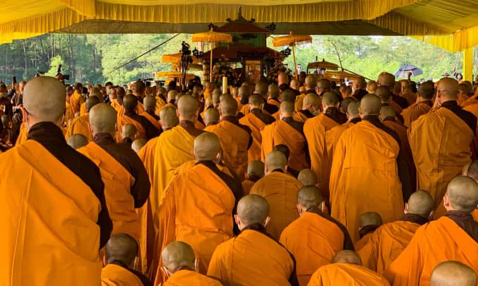 Buddhist monks take part in the funeral of Thich Nhat Hanh, the Zen Buddhist monk, poet and peace activist who in the 1960s came to prominence as an opponent of the Vietnam War.