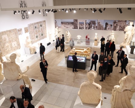 Visitors walk inside the National Museum in Tripoli.