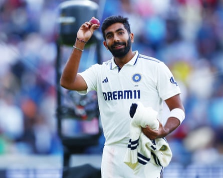 Jasprit Bumrah shows the ball after taking five wickets