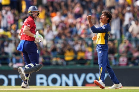 Dunith Wellalage celebrates the wicket of Jos Buttler.