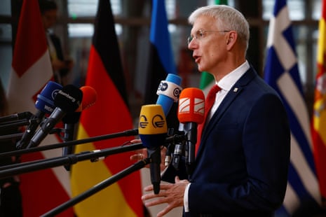Latvia’s Prime Minister Krisjanis Karins speaks as he attends a European Union leaders’ summit in Brussels.