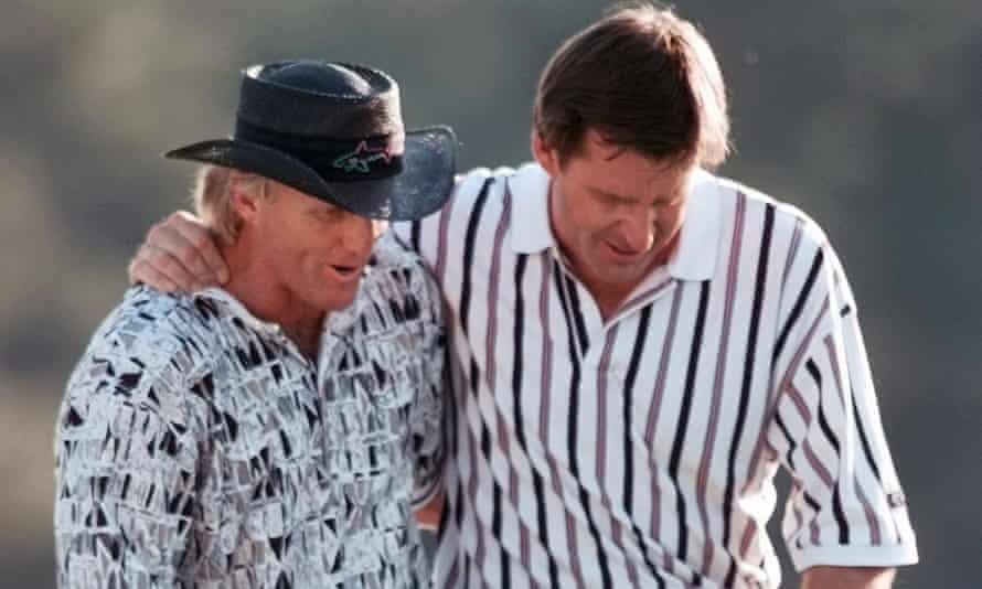 Greg Norman with Nick Faldo on the 18th at Augusta in 1996, after the Australian’s final-round collapse helped the Englishman win his third Masters.
