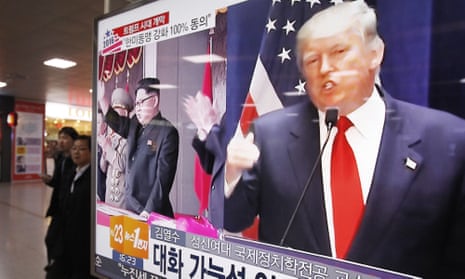 Donald Trump and Kim Jong-un flash up on television screens at Seoul railway station last week.