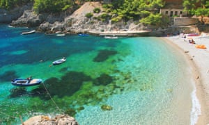 Beach boats clear water blace beach