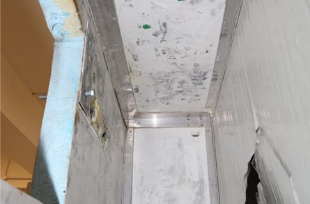 Small compartment inside a van, with white interior