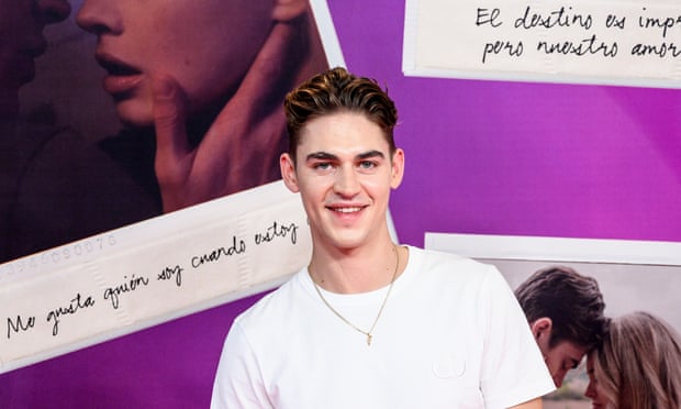 Hero Fiennes-Tiffin poses at a movie premiere in Spain.