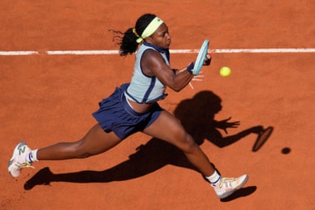 Coco Gauff returns the ball with a forehand to Iga Swiatek during their semi-final at the Italian Open tennis tournament in Rome during May 2024.