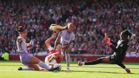 Caitlin Foord shoots while under pressure from Brighton’s Maisie Symonds and Maelys Mpomé.