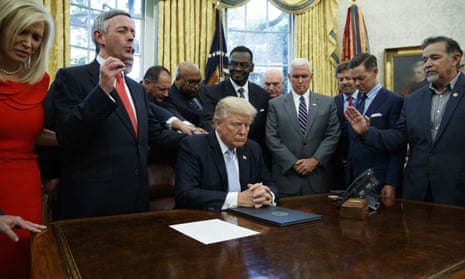 Donald Trump with religious leaders for a national day of prayer in September 2017.