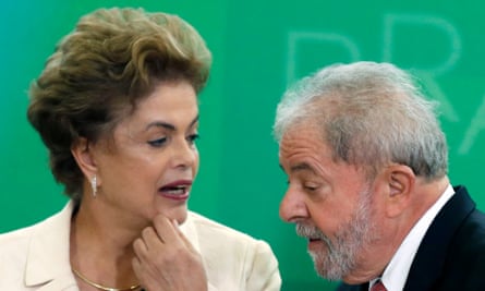 Brazil’s former president, Luiz Inácio Lula da Silva, right, is sworn in as the new chief of staff of President Dilma Rousseff, left.