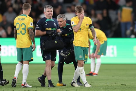 Riley McGree leaves the field after injuring his foot.