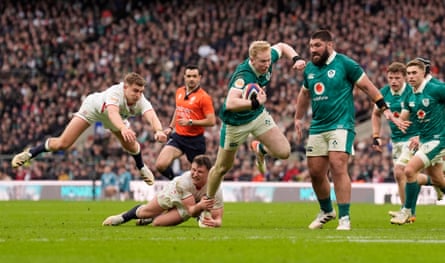 Jamie Osborne on the way to scoring IrelandâÂÂs fifth try