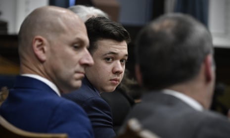 RITTENHOUSE Murder Trial Courtroom, Kenosha, Wisconsin, USA - 18 Nov 2021<br>Mandatory Credit: Photo by Sean Krajacic/The Kenosha News/POOL via ZUMA Press Wire/REX/Shutterstock (12608484m) Kyle Rittenhouse, center, looks over to his attorneys as the jury is dismissed for the day during his trial at the Kenosha County Courthouse in Kenosha, Wis., on Thursday, Nov. 18, 2021. RITTENHOUSE Murder Trial Courtroom, Kenosha, Wisconsin, USA - 18 Nov 2021