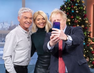 Phillip Schofield, Holly Willoughby and Boris Johnson on the This Morning set in London