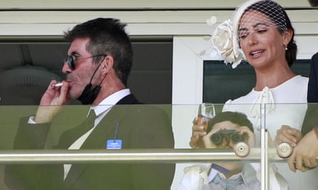 Simon Cowell smokes a cigarette at Epsom in 2021
