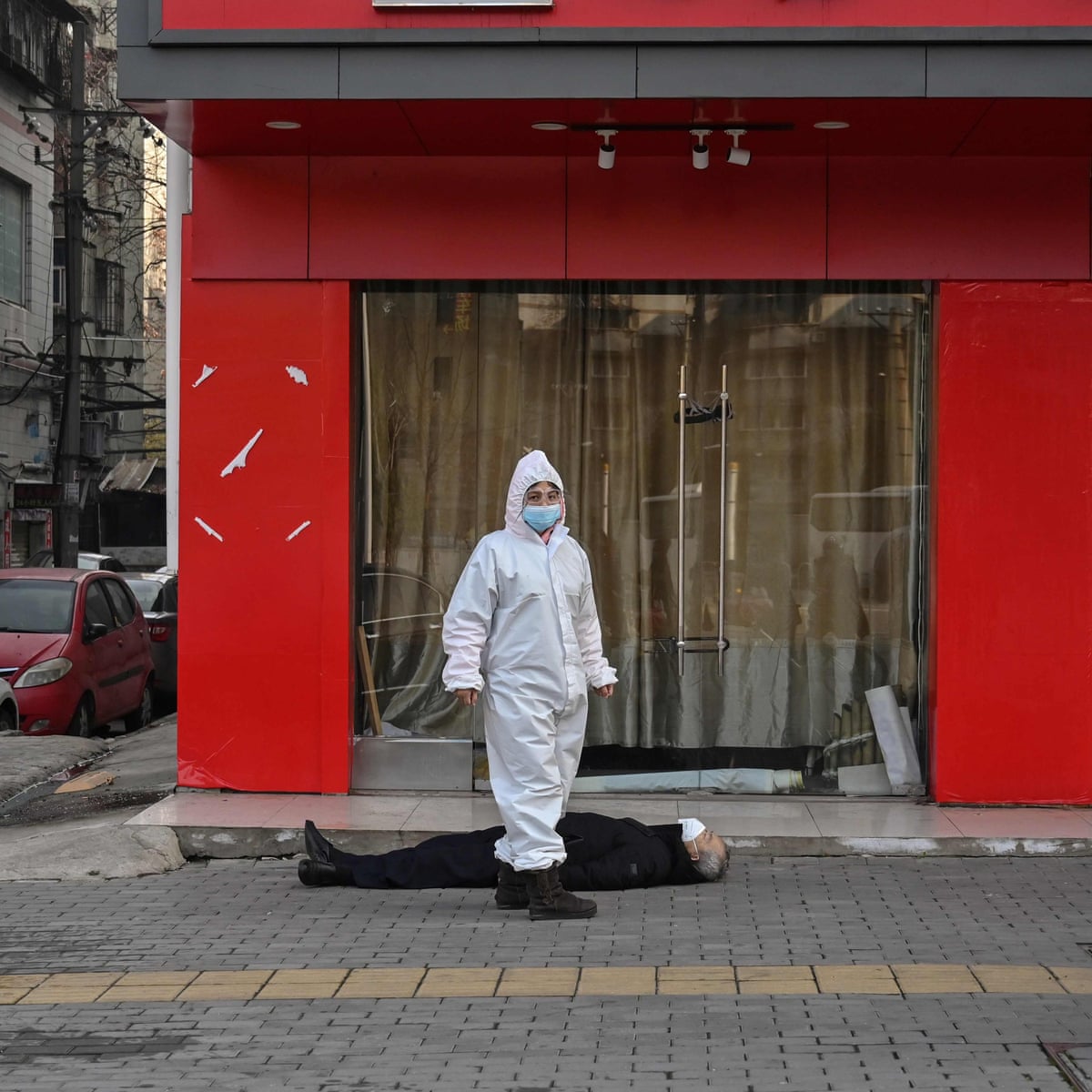 A Man Lies Dead In The Street The Image That Captures The Wuhan