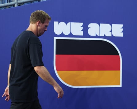 The Germany head coach Julian Nagelsmann walks off the field head down in disappointment after his team lose on penalties to Paraguay in the last 32 of the 2026 World Cup.