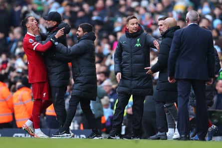 25 November 2023 Jürgen Klopp restrains Darwin Nuñéz as he reacts towards Pep Guardiola during the match between Liverpool and Manchester City at the Etihad Stadium. The game ended 1-1.