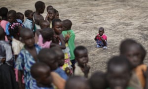South Sudanese refugee children line up before class in Bidi Bidi refugee settlement, northern Uganda. 