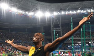 Jamaica’s Usain Bolt celebrates after he won the men’s 100m final.