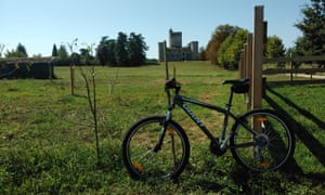 Mountain bike parked in front of Chateay