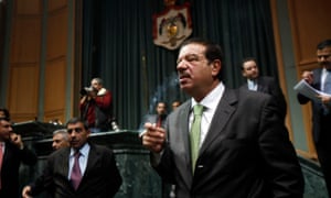 Jordanian Prime Minister Wins Confidence Vote At Parliament<br>AMMAN, JORDAN - DECEMBER 01: President of the Jordanian Parliament Abdel-Karim al-Doghmi smokes after Prime Minister Awn Khasawneh won a comfortable vote of confidence for his government from parliament, following a four-day debate on his policies, on December 1, 2011 in Amman, Jordan. The MPs voted 89-25, and urged Khasawneh to meet demands for reform and against corruption. (Photo by Salah Malkawi/ Getty Images)