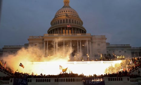 A police flash-bang grenade is detonated during the attack on the US Capitol on 6 January 2021.