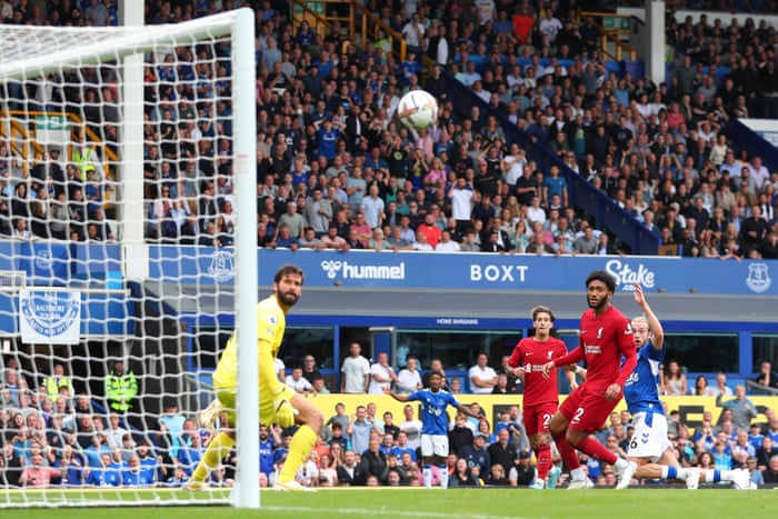 Tom Davies' shot heads for the post.