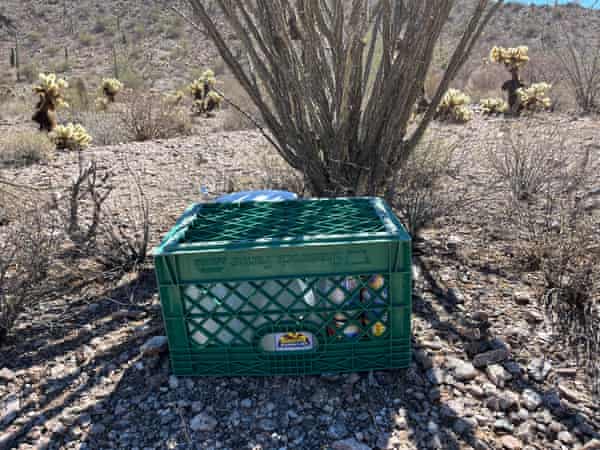 Volunteers leave water, beans, Gatorade and a medical blanket in a shady spot in the desert where migrants have been passing through.