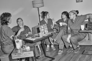 Midwife Chemin Perez and a group of student midwives relax between births at the New Life Midwifery Birth Center.