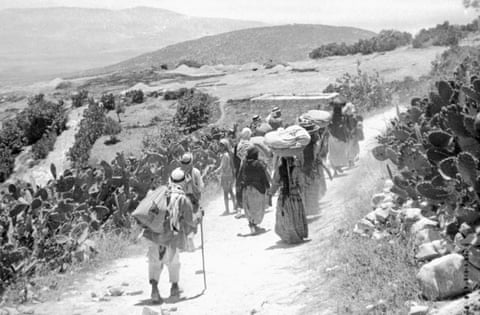 Palestinians after the surrender of their village in 1948.