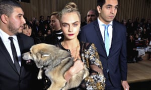 Cara Delevingne and front row dog Leo.