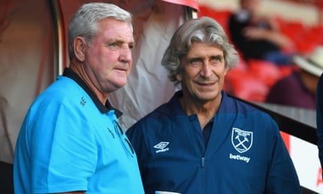 Aston Villa manager Steve Bruce with West Ham boss Manuel Pellegrini before Wednesday night’s friendly.