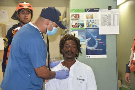 Sailor Elvis Fracois being checked after his rescue on the Caribbean sea in Colombia.