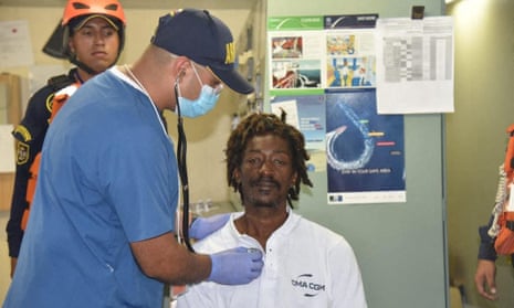 Elvis François receiving a medical check up
