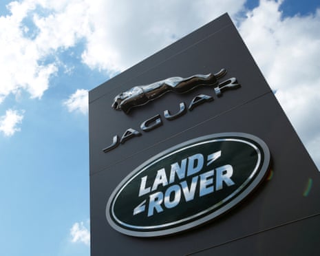 The Jaguar Land Rover logo at a dealership